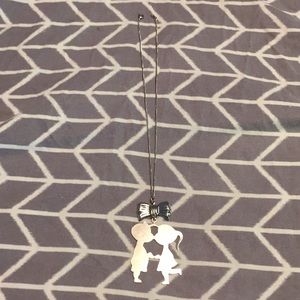 Boy and girl kissing necklace